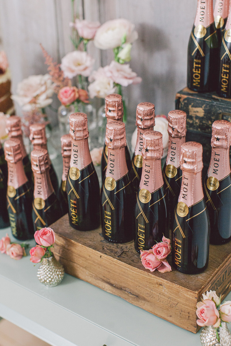 a collection of individual Moët rose bottles from a commercial photography lifestyle product shoot.
